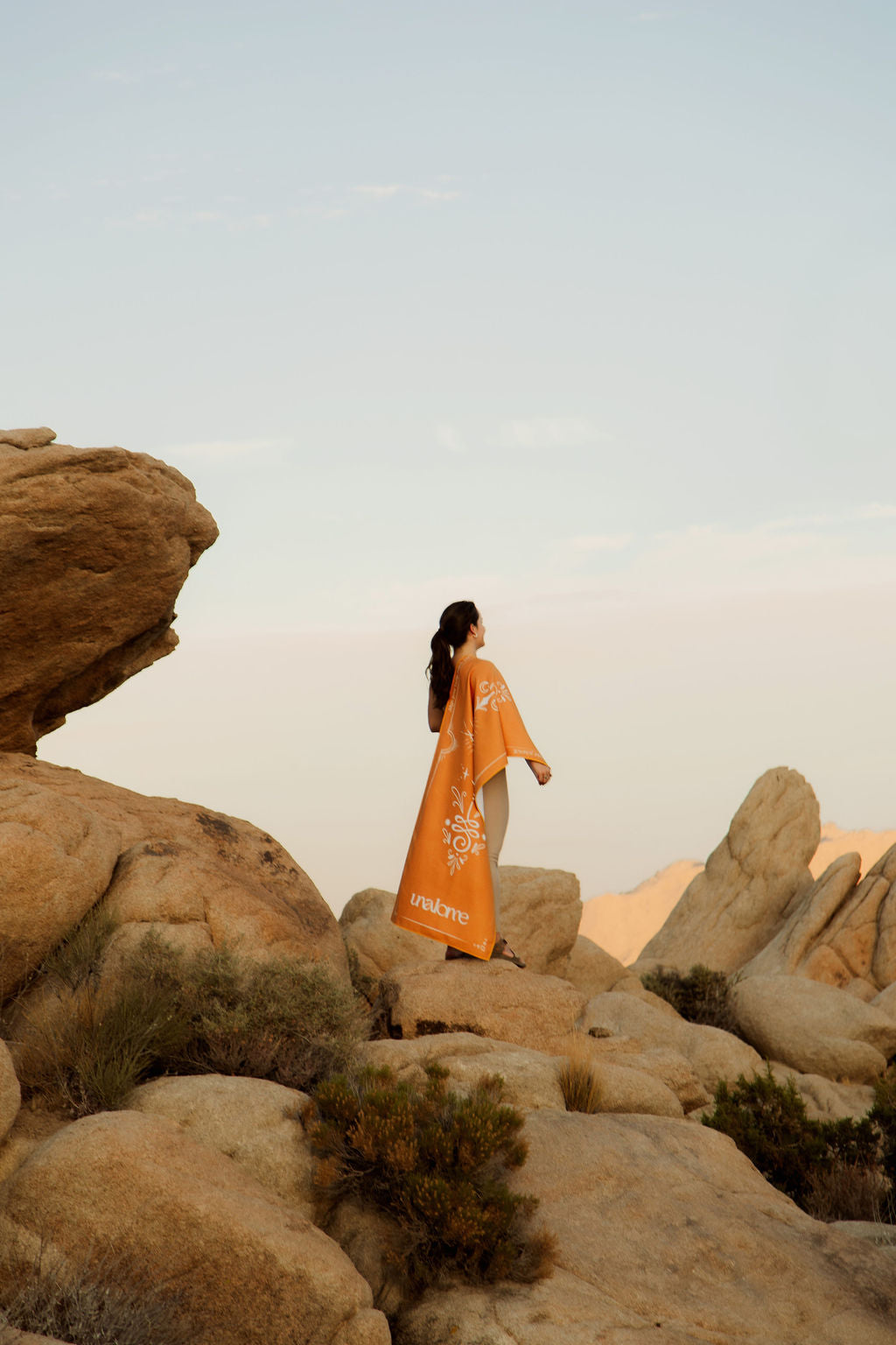 Yogi with Gia Non-Slip, eco-friendly and 44% more silicone grip yoga towel in Joshua Tree setting