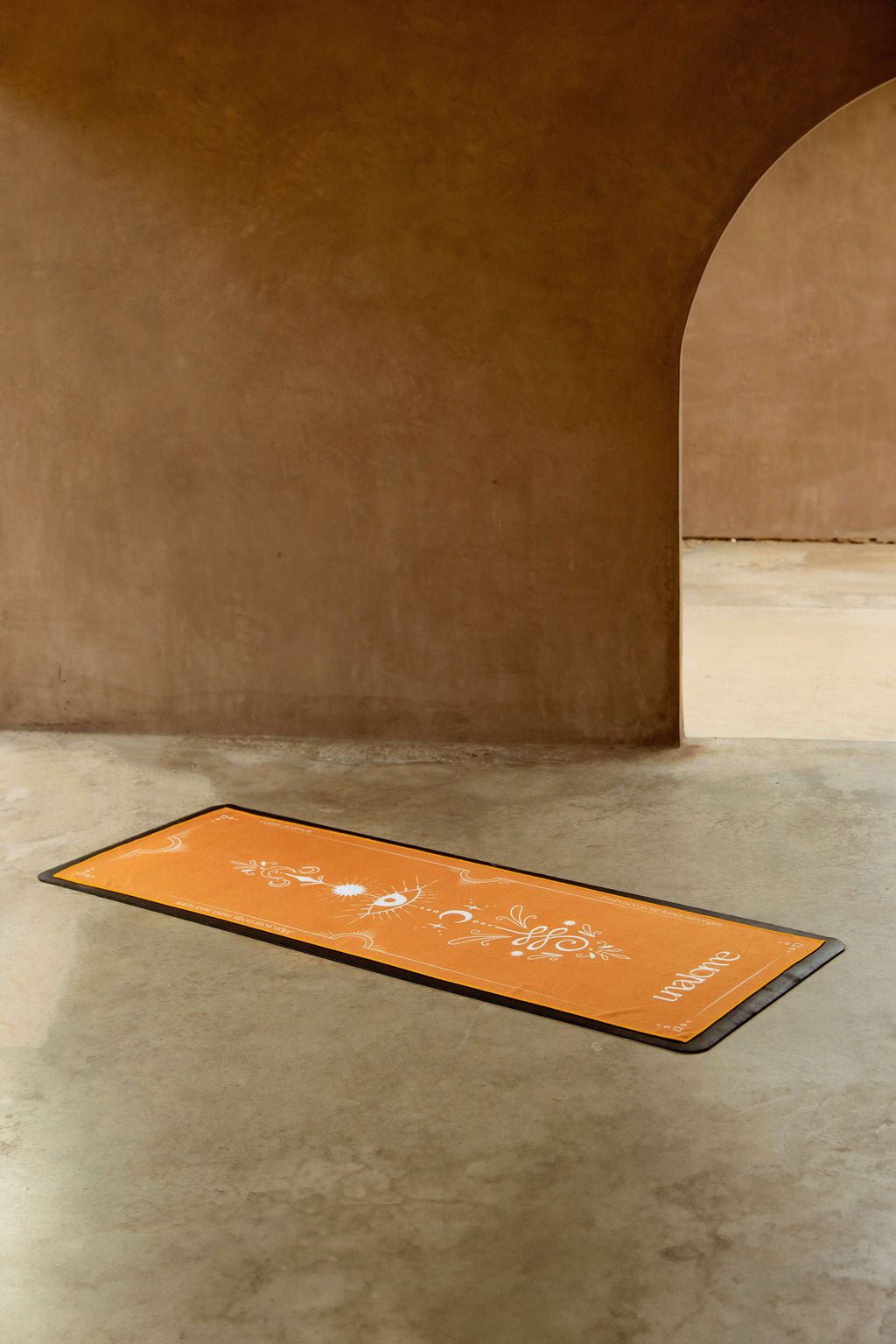 Close-up of Gaia towel’s artwork – premium hot yoga towel from Unalome Yoga with sacred-inspired design